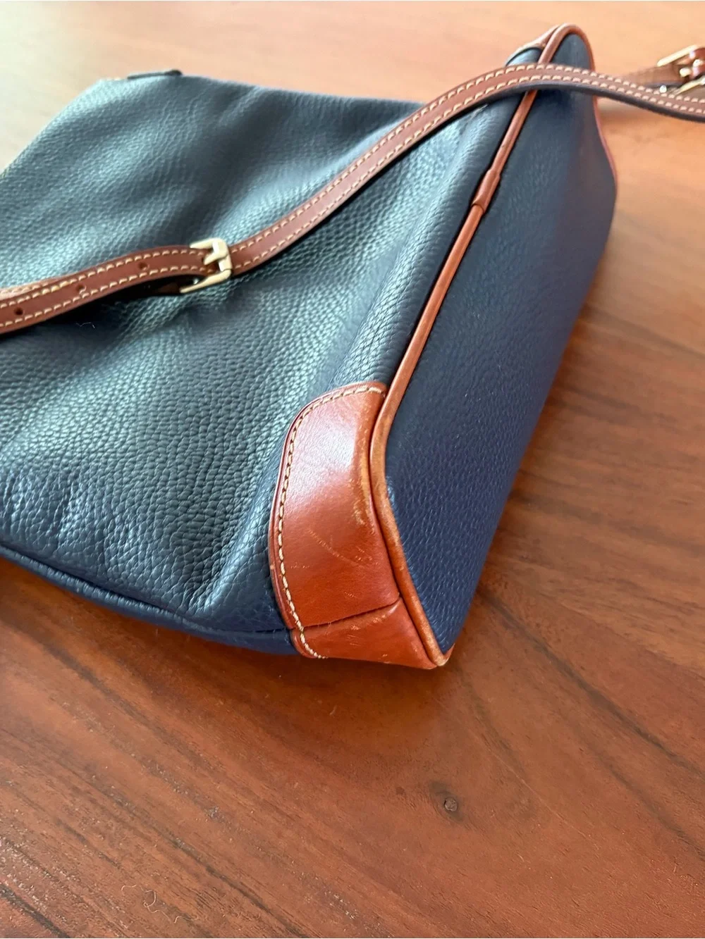 Dooney & Bourke Black Pebbled Leather Crossbody with Brown Trim & Gold Plate